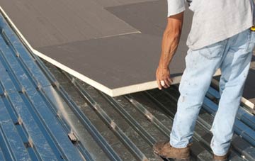 benefits of insulating Upper Caldecote flat roofing